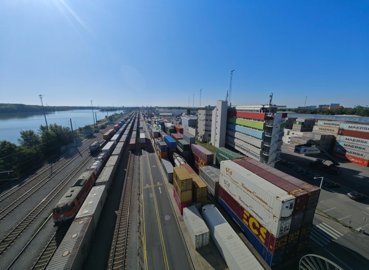 Rail yard with stacked shipping containers